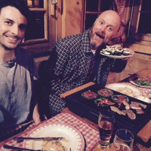 man with plate of food at the crapahute morzine