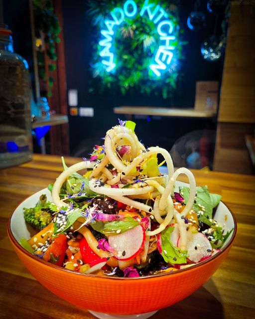 kamado kitchen logo with fresh food in a bowl