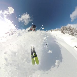 man skiing powder in Morzine