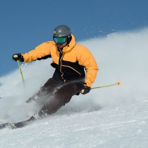 man skiing whilst on luxury ski holiday in Morzine