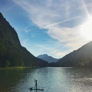 paddle boarding on montriond lake
