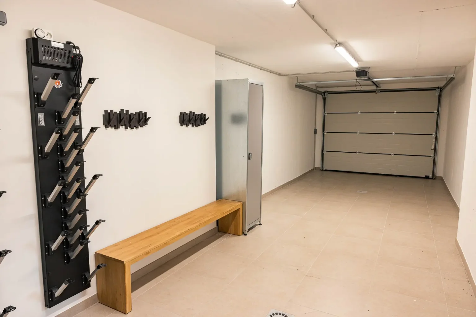 Garage with boot dryers and parking for two cars